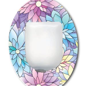 May include: An oval-shaped adhesive patch featuring a vibrant floral pattern with overlapping petals in shades of purple, light blue, and soft yellow. A solid white, rectangular-shaped area is centered on the patch, providing a clear space.