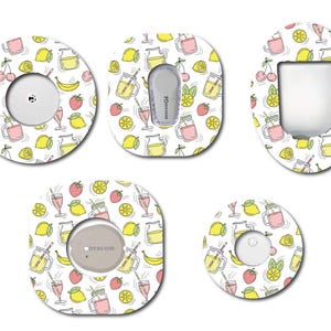 May include: A collection of patterned medical device covers. The covers feature a white background with a repeating pattern of lemons, strawberries, cherries, and juice glasses. The covers are in various shapes and sizes, designed to fit different devices.