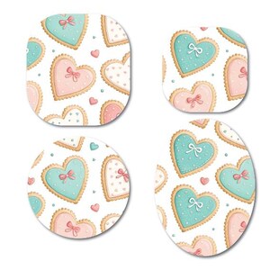 May include: Four heart-shaped designs featuring a pattern of heart-shaped biscuits. The biscuits have a light brown edge, and are decorated with pink or teal icing and a bow. Small pink hearts are scattered on a white background.