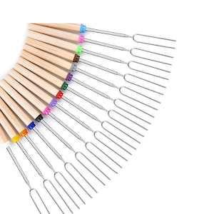 May include: A set of 12 colorful marshmallow roasting sticks with wooden handles and metal forks. The sticks are arranged in a fan shape, with the handles at the top and the forks at the bottom.