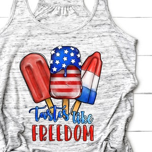 May include: A gray tank top with a graphic of three popsicles. The popsicles are red, white, and blue, and the text "Tastes like FREEDOM" is printed below them.