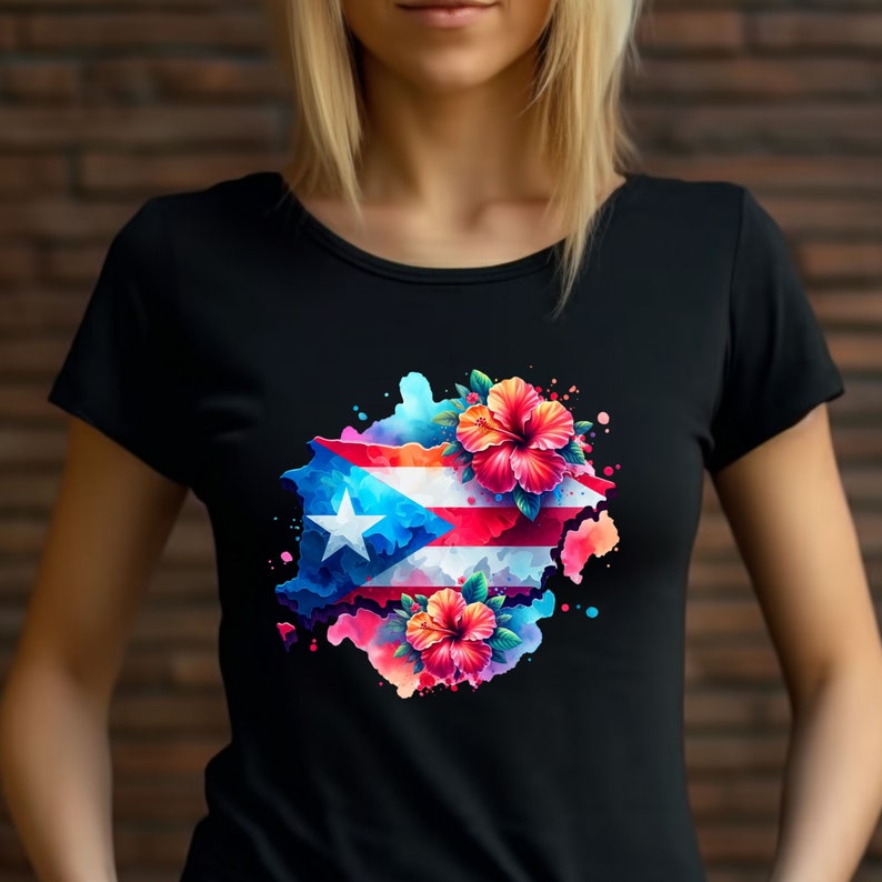 May include: Black t-shirt with a colorful watercolor design featuring the Puerto Rican flag and hibiscus flowers.