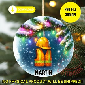 May include: Round Christmas ornament featuring a construction worker theme. The ornament has a yellow hard hat and orange safety vest. The ornament is decorated with colorful lights and the name "MARTIN". The text "DOWNLOAD" and "PNG FILE 300 DPI" are also visible.