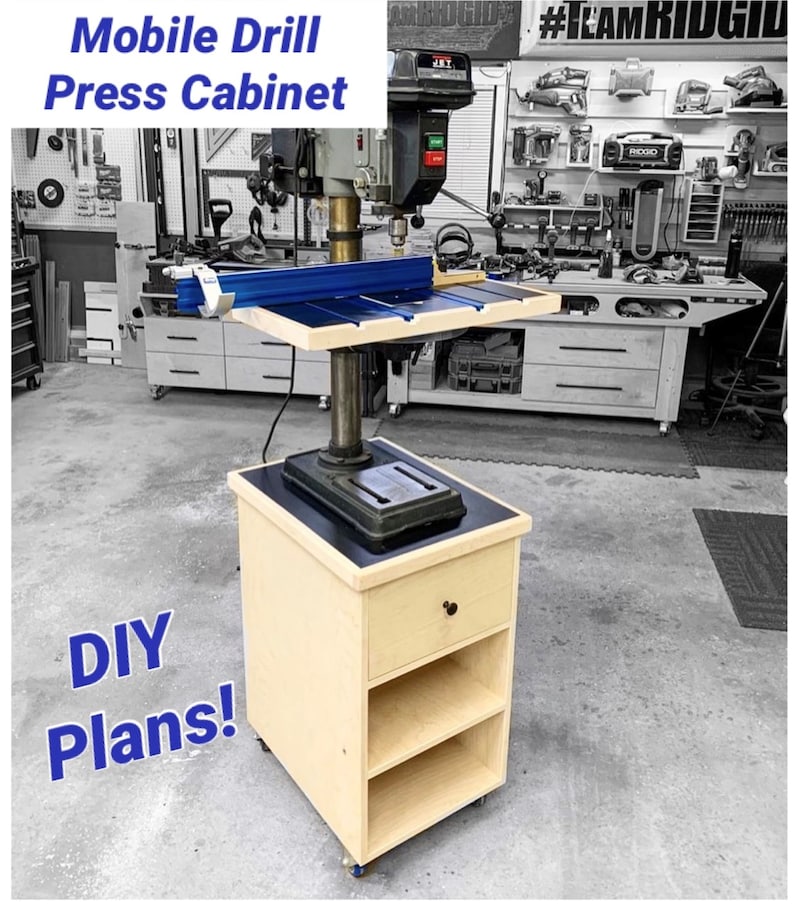 May include: A mobile drill press cabinet with a light wood finish, featuring a black top and a drawer. The cabinet has two open shelves and is mounted on wheels. Text on the image reads "Mobile Drill Press Cabinet" and "DIY Plans!"