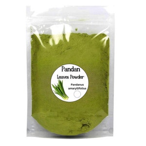 May include: A clear plastic bag filled with green pandan leaves powder. The label reads "Pandan Leaves Powder" and "Pandanus amaryllifolous".