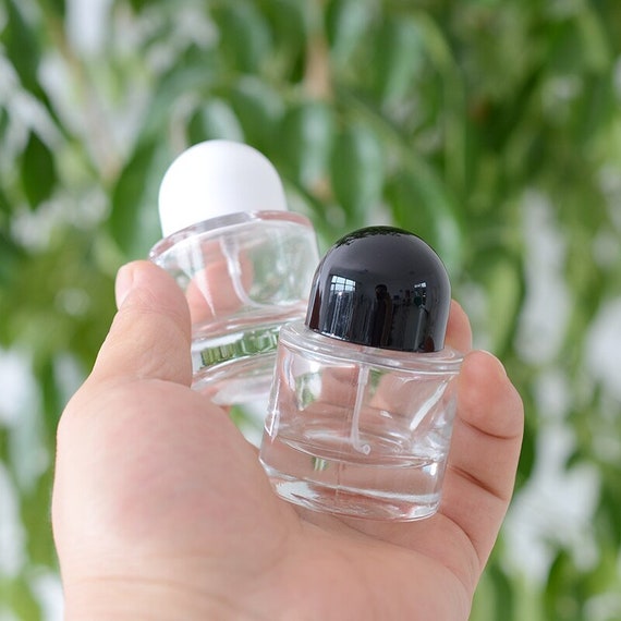 Wholesale Cosmetic Packaging 30ml 50ml 100ml Empty Round Clear glass  perfume bottle with spray From m.