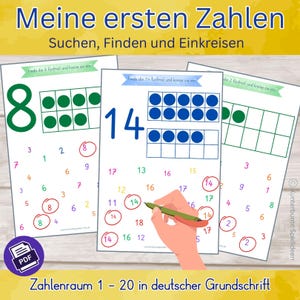 Peut inclure: Trois feuilles de travail avec le texte "Meine ersten Zahlen" et "Zahlenraum 1-20 in deutscher Grundschrift". Les feuilles de travail présentent les chiffres 8, 14 et 2, avec des cercles autour des chiffres. Une main entoure le chiffre 14 avec un stylo vert.