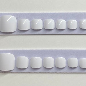 Weiße Presse auf Zehennagel