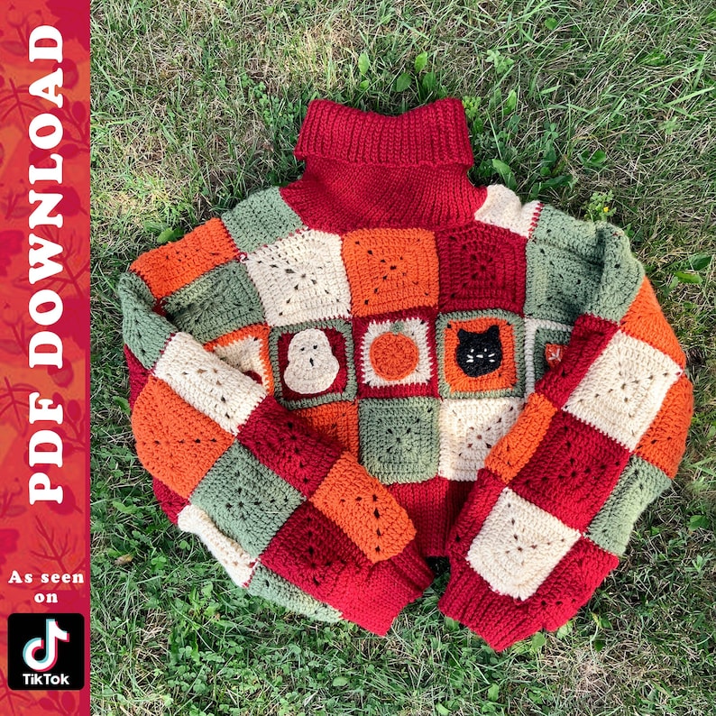 May include: A red, orange, green, and cream crocheted sweater with a turtleneck. The sweater is made of squares with different Halloween-themed motifs, including a ghost, a pumpkin, and a black cat.