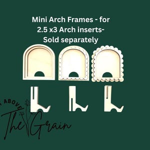 May include: Three unfinished wooden mini arch frames with matching stands are displayed against a dark green background. The frames have different edge designs. Text reads "Mini Arch Frames - for 2.5 x3 Arch inserts - Sold separately."