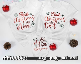 May include: Three white t-shirts with Christmas-themed text. The largest shirt says "First Christmas as Mom" in red and green. The medium shirt says "First Christmas as Dad" in red and green. The smallest shirt says "My 1st Christmas" in red and green with a candy cane graphic.