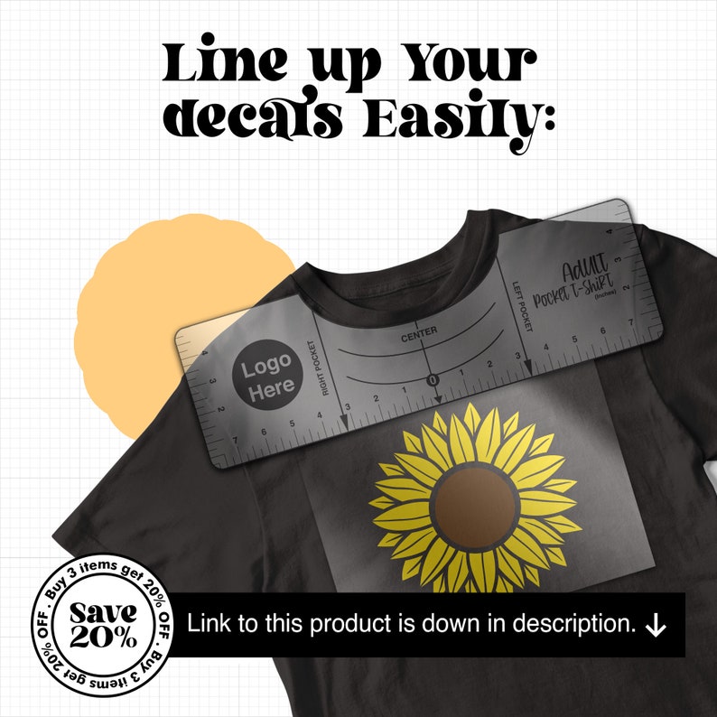 May include: A black t-shirt with a sunflower graphic and a clear plastic ruler with the words "Adult Pocket T-Shirt" and "Logo Here".