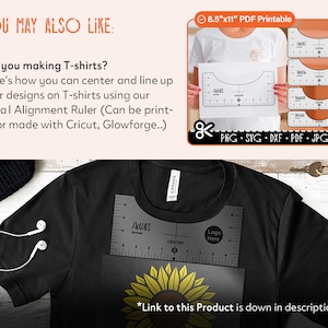 May include: A black t-shirt with a sunflower design and a decal alignment ruler printed on it. The ruler is labeled "Adult" and has markings for centering and lining up designs. The ruler is 8.5 inches by 11 inches and is printable.
