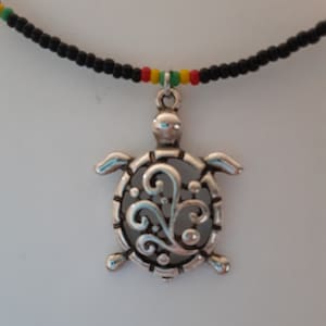 Antique Silver Turtle necklace beaded with Rasta colored seed beads
