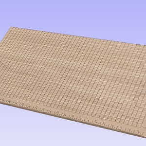May include: A brown cutting mat with a grid pattern and inch markings along the edges.