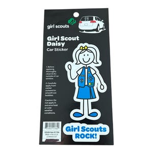 May include: A white car sticker featuring a stick figure of a Girl Scout Daisy in her uniform. The sticker has the text "Girl Scout Daisy Car Sticker" and "Girl Scouts ROCK!"