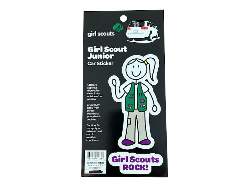 May include: A black and white sticker of a Girl Scout Junior wearing a green vest with colorful badges. The sticker says "Girl Scouts ROCK!" and includes instructions for applying the sticker.