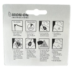 May include: Iron-on instructions with illustrations showing how to apply an iron-on patch to a garment. The instructions include steps for preheating the iron, placing the patch, and pressing with a cloth. The instructions also include laundering instructions.