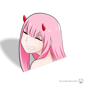 May include: A pink anime character with red horns and a closed-eye smile. The character has long pink hair and is looking to the right.