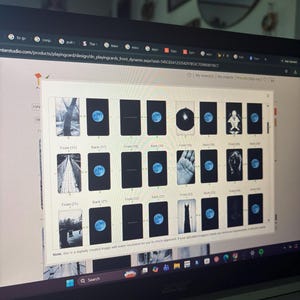 May include: A computer screen displaying a digital interface for designing a deck of playing cards. The grid shows multiple card fronts with various black and white photographic images and card backs featuring a blue moon graphic on a black background.