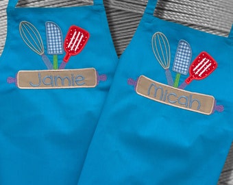 Childrens Embroidered Apron Cute Baking Kitchen Design and Personalised with Child's Name. Available in a Choice of Colours