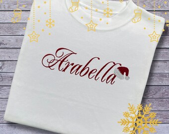 Personalised Embroidered Childrens Christmas Top. Cute Design with Name and Santa Hat. Perfect for the Christmas Season. Choice of Garment