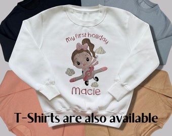 Personalised Embroidered Children's 1st Holiday Top. Wording and Colours Can be Changed to Your Preference. Cute Girl Flying an Aeroplane.