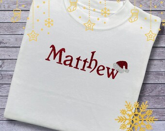 Personalised Embroidered Childrens Christmas Top. Cute Design with Name and Santa Hat. Perfect for the Christmas Season. Choice of Garment