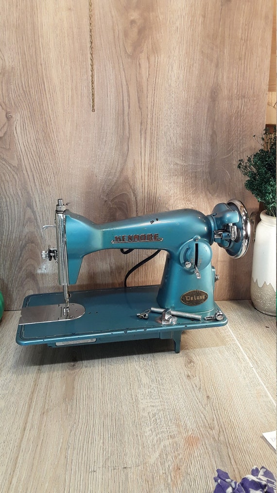 Vintage Sears Kenmore electric portable sewing machine with green