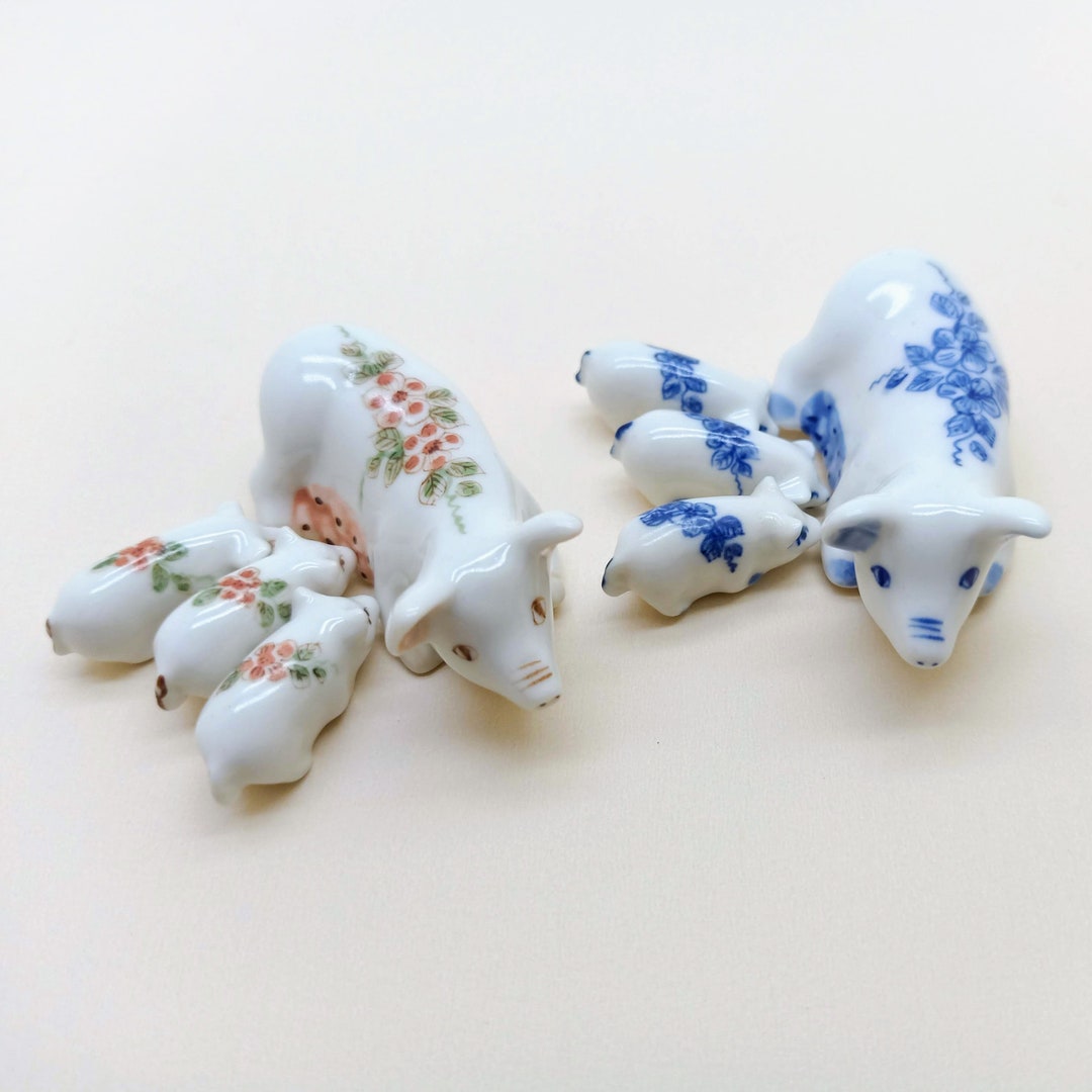 4-white-pigs-ceramic-figurines-with-floral-pattern-farm-animal