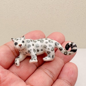 Hand-Painted Ceramic Snow Leopard Figurine: Wildlife Collector Decor