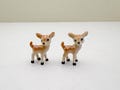Tiny Ceramic Fawn Figurines: Hand-Painted Baby Deer Ornaments, Set of 2 product logo