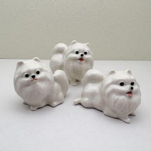 Charming White Ceramic Pomeranian Figurine Set, Trio of Lifelike Dog Figurines in Unique Poses, Ideal for Pet Lovers, Home Decor Enthusiasts
