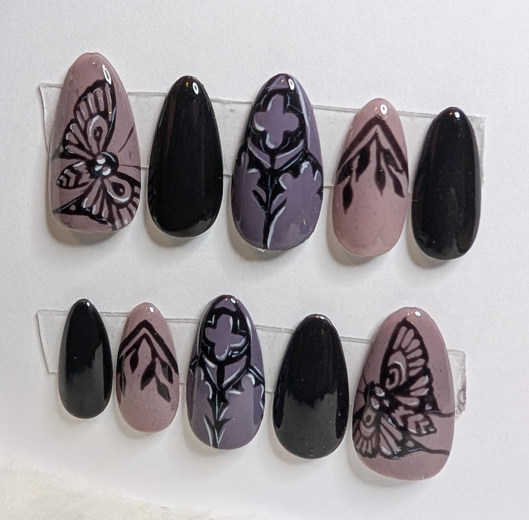 Edgy Black Faux Moth Nail Art