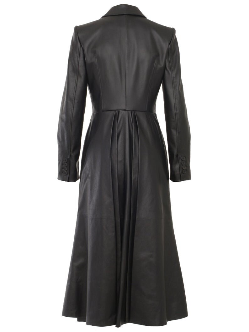 May include: A long black leather coat with a fitted bodice and a flared skirt. The coat has a double-breasted closure and a high collar.