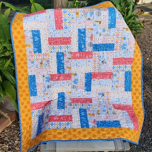 Cirkusräcke. Handgjort lapptäcke för spjälsäng, lekmatta, babyshowerpresent.