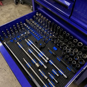 May include: A blue metal tool chest drawer containing a collection of silver and black steel socket wrenches, various drive extensions, and assorted socket sizes organized on a black pegboard tray with blue plastic accents and holders.