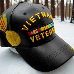Vietnam War Veteran Faux Leather Hat – Embroidered Baseball Cap. Military Hat  – Patriotic Veteran Cap. Vietnam Veteran Hat. Vietnam War Vet