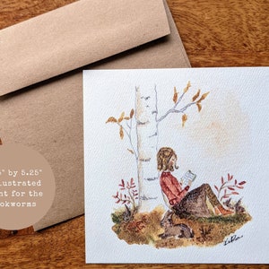 May include: A 5.25" by 5.25" illustrated print for bookworms. The watercolor art depicts a person reading under a tree, with a small animal nearby. The print is accompanied by a brown envelope.