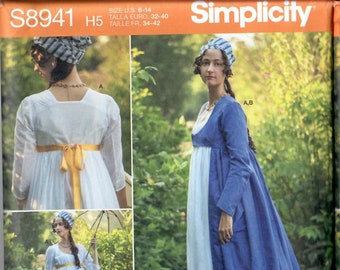 May include: Simplicity sewing pattern number S8941, size US 6-14, Euro 32-40, French 34-42, for a long white dress with a yellow sash and a blue overdress. The pattern is from American Duchess.