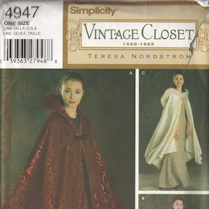 May include: Simplicity Vintage Closet sewing pattern featuring capes. The pattern includes a red cape with a swirl design, a white cape with a fur collar, and a black cape with a purple lining. The pattern is one size.