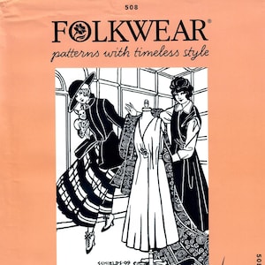 May include: Black and white illustration of a vintage traveling suit pattern. The illustration shows two women, one wearing a hat and the other holding a dress form. The text "Traveling Suit" and "Pattern 508" is included in the image.