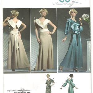 May include: Simplicity 3619 sewing pattern for floor-length dresses. Features include a beige dress with a white collar and sash, and a teal satin dress with long sleeves and a tie waist. Includes illustrations of a floral print dress and back views.