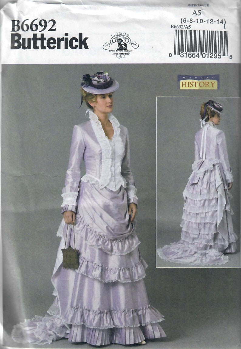 May include: A vintage sewing pattern for a long, layered dress with a ruffled skirt and a fitted bodice. The pattern is for sizes 6-8-10-12-14 and is from Butterick.