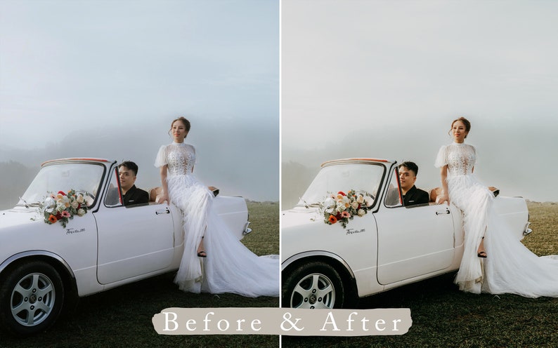 May include: A white convertible car with a floral arrangement on the hood. A bride and groom are standing on the car, the bride is wearing a white wedding dress and the groom is wearing a black suit.