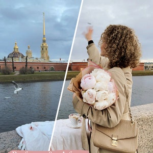 May include: A before and after photo showing a woman holding a bouquet of white and pink peonies. The photo on the left shows a view of a city skyline with a river in the foreground. The photo on the right shows the woman holding the bouquet in front of a city skyline with a river in the background.