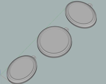 May include: Three silver oval-shaped medallions with a raised rim.