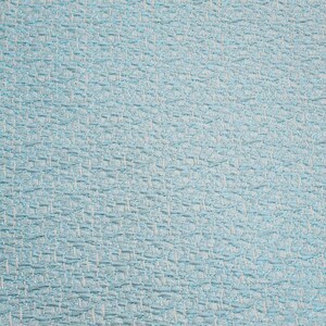 May include: A close-up of a light blue textured fabric with a subtle woven pattern.