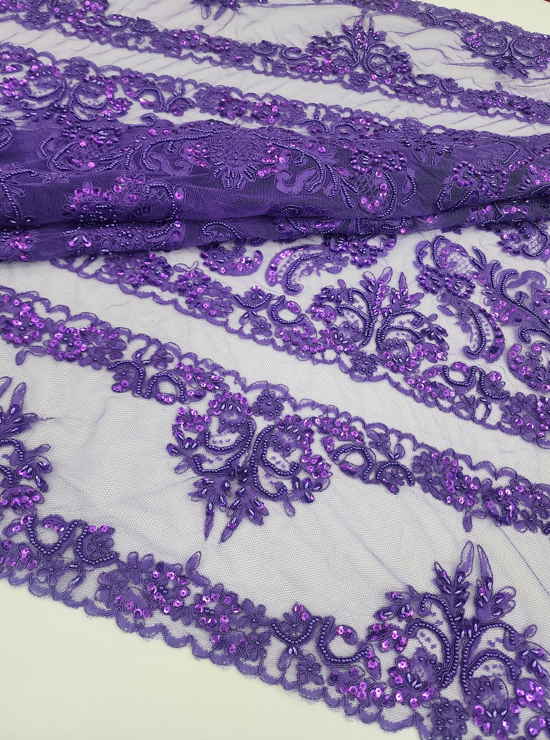 PURPLE HAND BEADED FLORAL DESIGN EMBROIDERY ON A MESH LACE-SOLD BY YARD. main image 1
