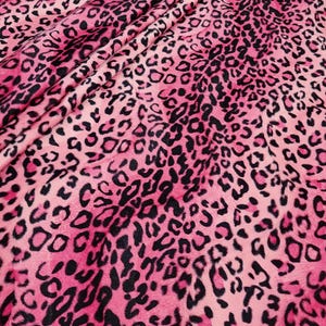 May include: Pink and black leopard print fabric with a soft, fuzzy texture.